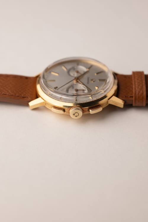 laydown detail image of Omega Gold Chronograph 101.009