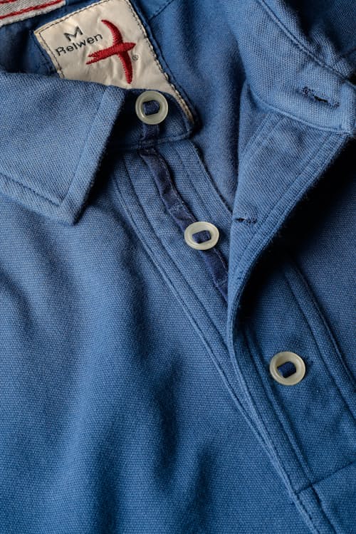 laydown detail image of Pique Slot Polo