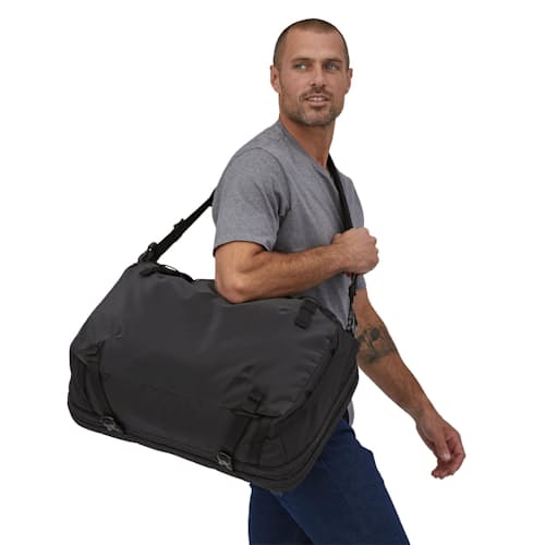 on model image of Black Hole MLC Travel Backpack - 45L