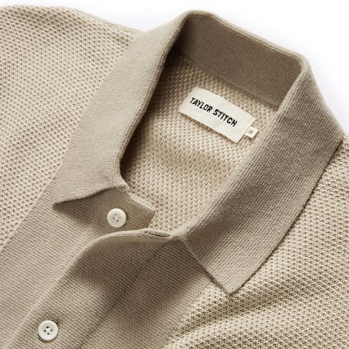 laydown image of The Button Down Polo