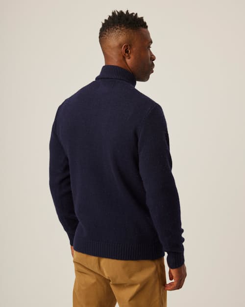 on model image of Merino Wool Turtleneck