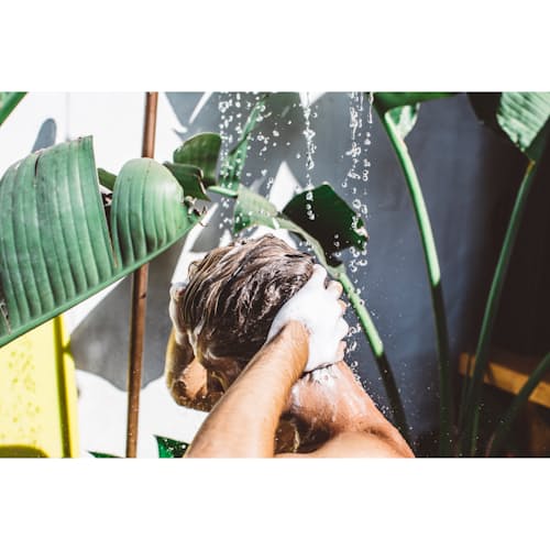 lifestyle image of Purifying Shampoo