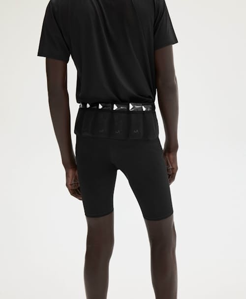 on model image of District Vision x Maurten Elite Fuel Half Tights