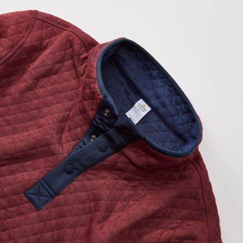 laydown detail image of Corbet Quilted Reversible Pullover