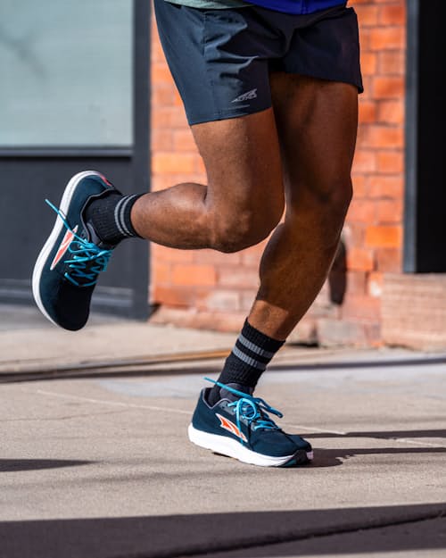 lifestyle image of Escalante 4 Running Sneaker