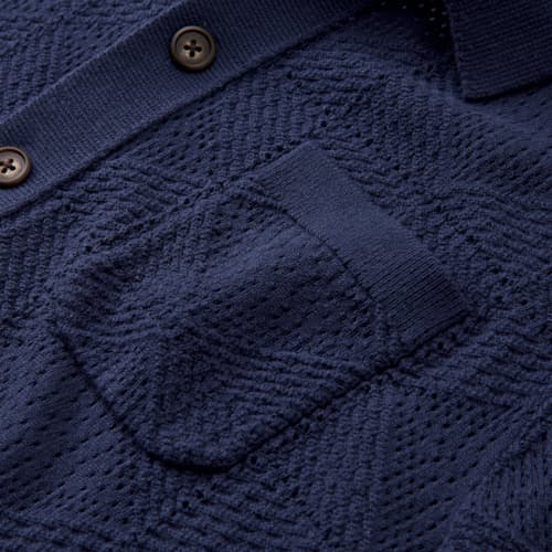 laydown detail image of Textured Button-Up Sweater Polo