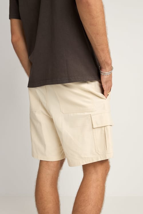 on model image of Combat Shorts