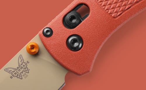 lifestyle image of Bugout Rust Orange Grivory Pocket Knife