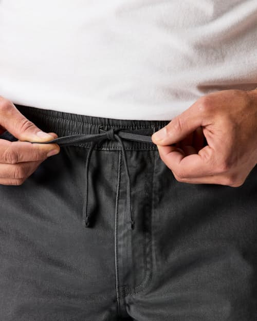 on model image of 365 Drawstring Short - 7"