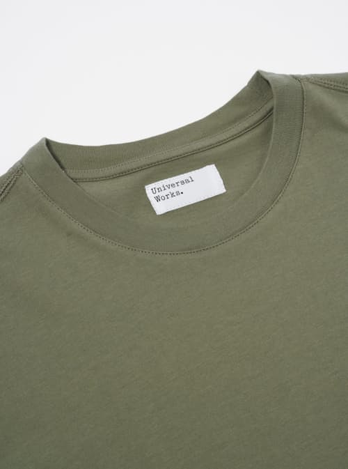 laydown detail image of Universal Works Logo T-Shirt