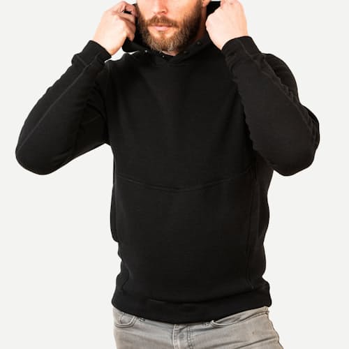 on model image of Cloudbase Merino: Heavy Weather Hooded Mid