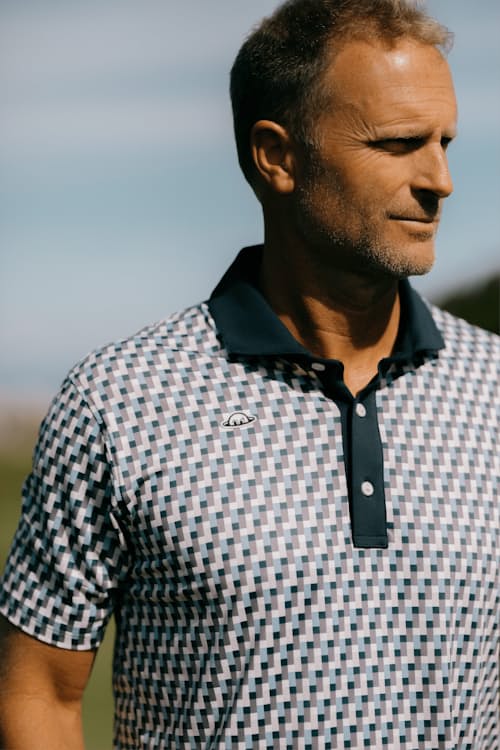 lifestyle image of Taylor Recycled Tetris Polo