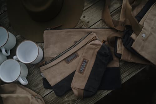 lifestyle image of Neelum Large Zipper Pouch - Khaki