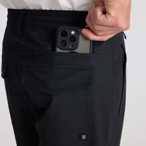 on model image of Layover Pro Traveler Short - 8"