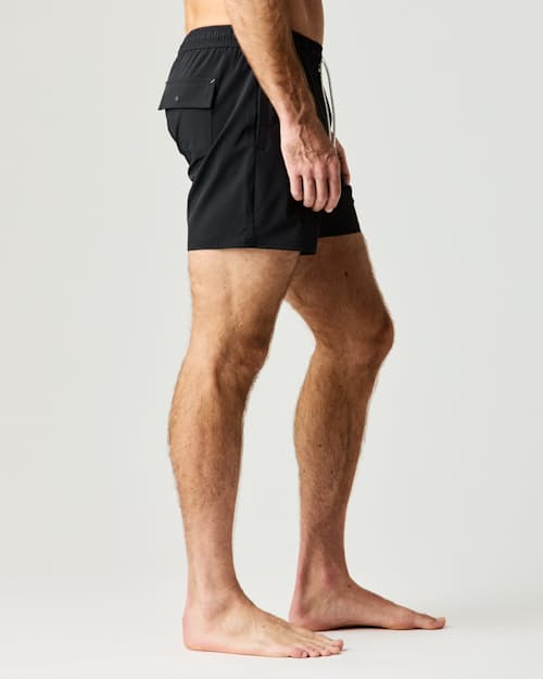 on model image of Performance Lined Swim Trunks - 5"