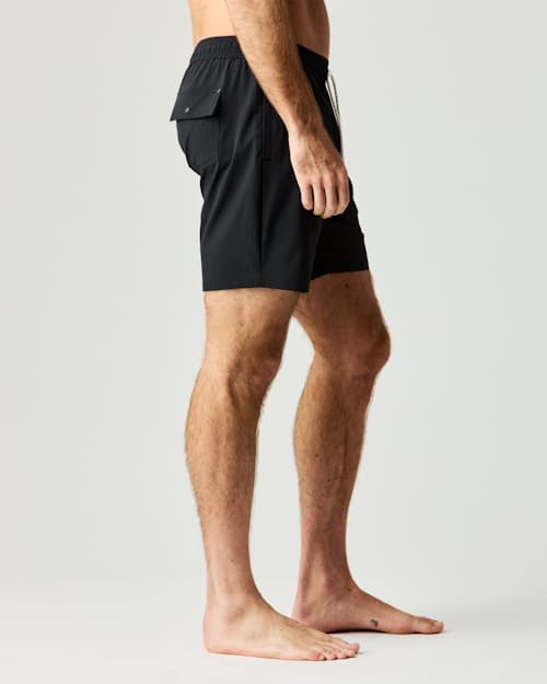 on model image of Performance Lined Swim Trunks - 7"