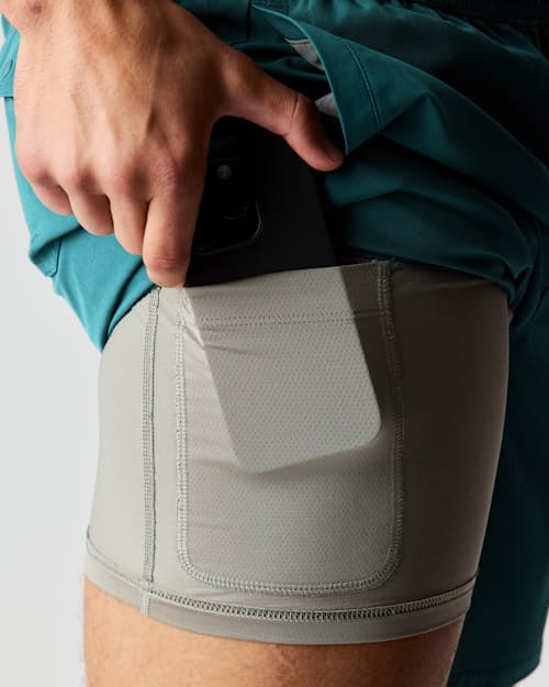 lifestyle image of Performance Lined Swim Trunks - 7"