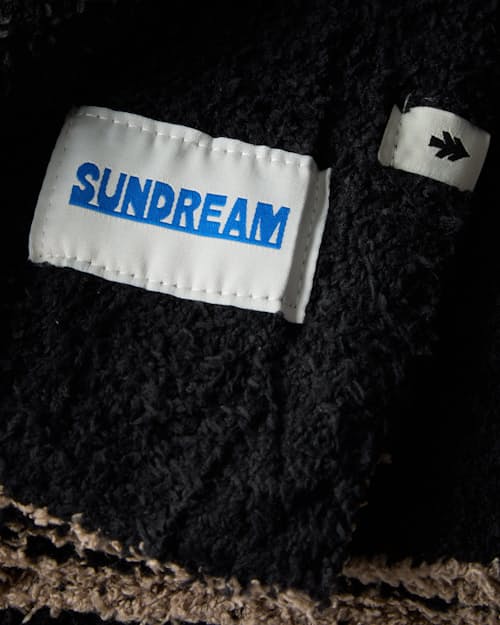 laydown detail image of Huckberry x Sundream Plush Cowboy Throw Blanket