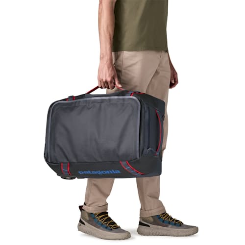 on model image of Black Hole Wheeled Duffel 40L