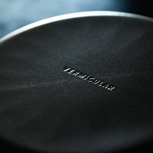 lifestyle image of Cast Iron Deep Frying Pan with Lid - 9.4"