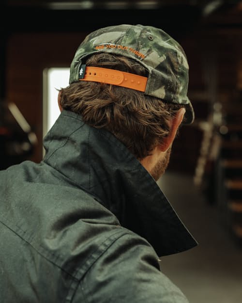lifestyle image of Camo Script Patch Hat