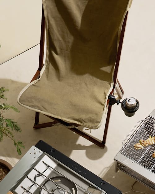 lifestyle image of "Campfire Director" Vaquero Chair