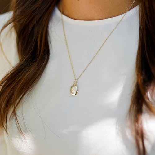 lifestyle image of Women's Diamond Locket Necklace