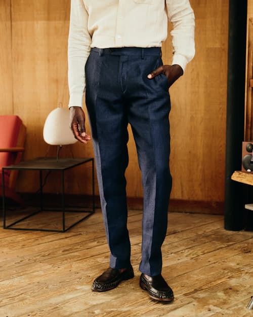 lifestyle image of The Stevens Linen Herringbone Trouser