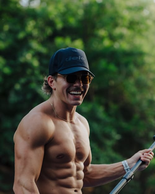 lifestyle image of TRLCapSC - Comp - Onehundred Hat