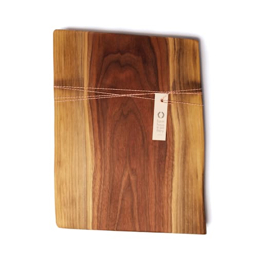 laydown image of Live Edge Walnut Cutting Board (15")