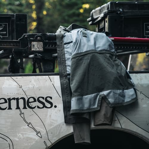 laydown image of Escape and Explore Rain Jacket