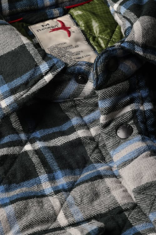 laydown detail image of Quilted Flannel Shirt Jacket