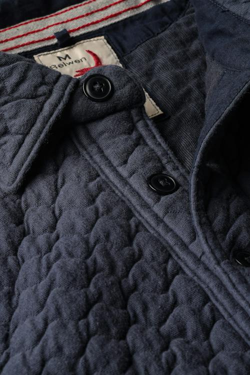 laydown detail image of Chain Quilt Polo