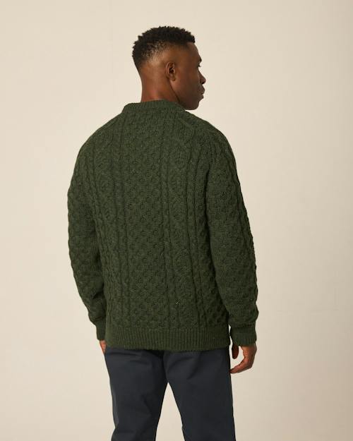 on model image of Hudson Aran Sweater