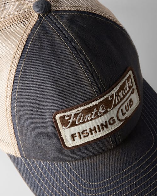 laydown detail image of Fishing Club Trucker Hat