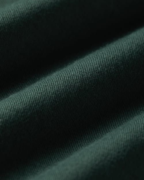 laydown detail image of AloeKnit Polo Shirt