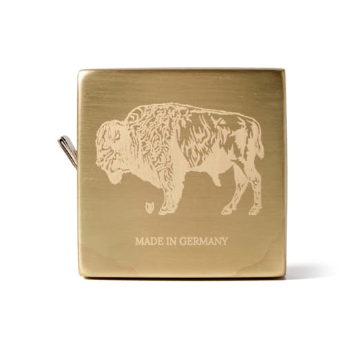 laydown image of Brass Measuring Tape - Engraved Bison