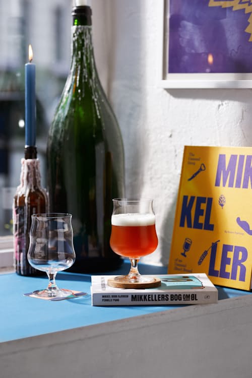 lifestyle image of Holmegaard x Mikkeller Universal Beer Glass