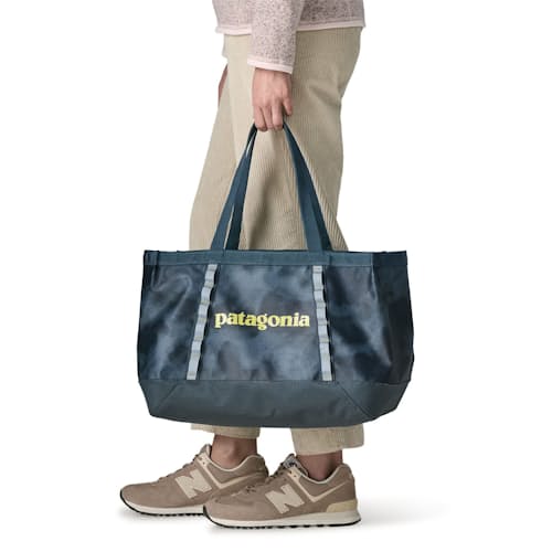 on model image of Black Hole Tote 25L