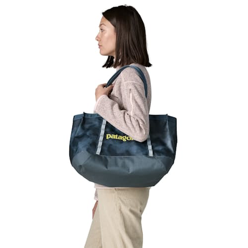 on model image of Black Hole Tote 25L