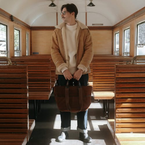lifestyle image of Meline Suede Business Bag