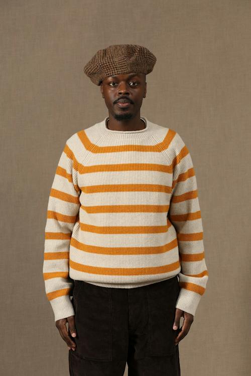 on model image of Kobe Rolled Neck Sweater