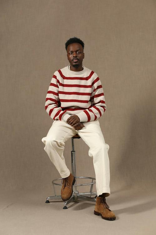 on model image of Kobe Rolled Neck Sweater