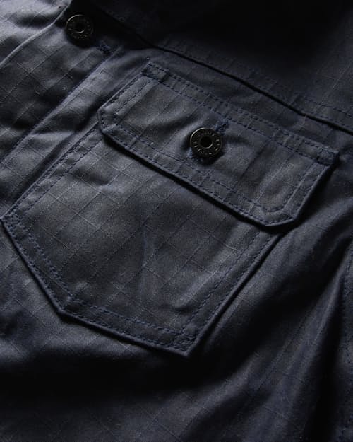 laydown detail image of Flannel-Lined Waxed Trucker Jacket