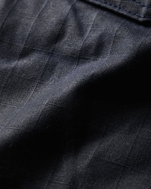 laydown detail image of Flannel-Lined Waxed Trucker Jacket