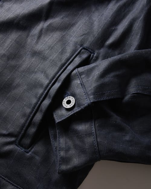 lifestyle image of Flannel-Lined Waxed Trucker Jacket