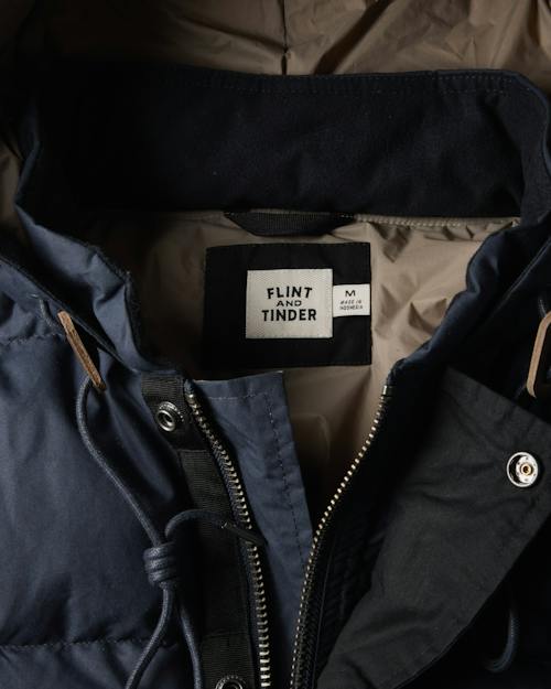 laydown detail image of Waxed Quilted Down Jacket
