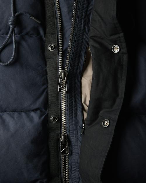 laydown detail image of Waxed Quilted Down Jacket
