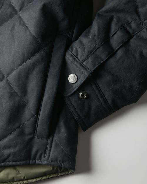 laydown detail image of Quilted Waxed Western Jacket