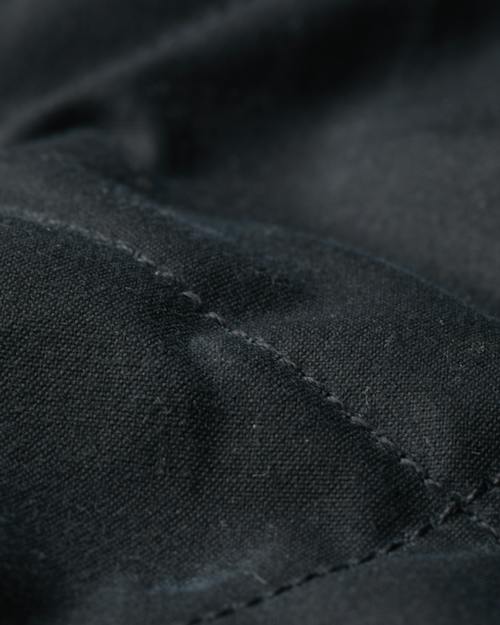 laydown detail image of Quilted Waxed Western Jacket